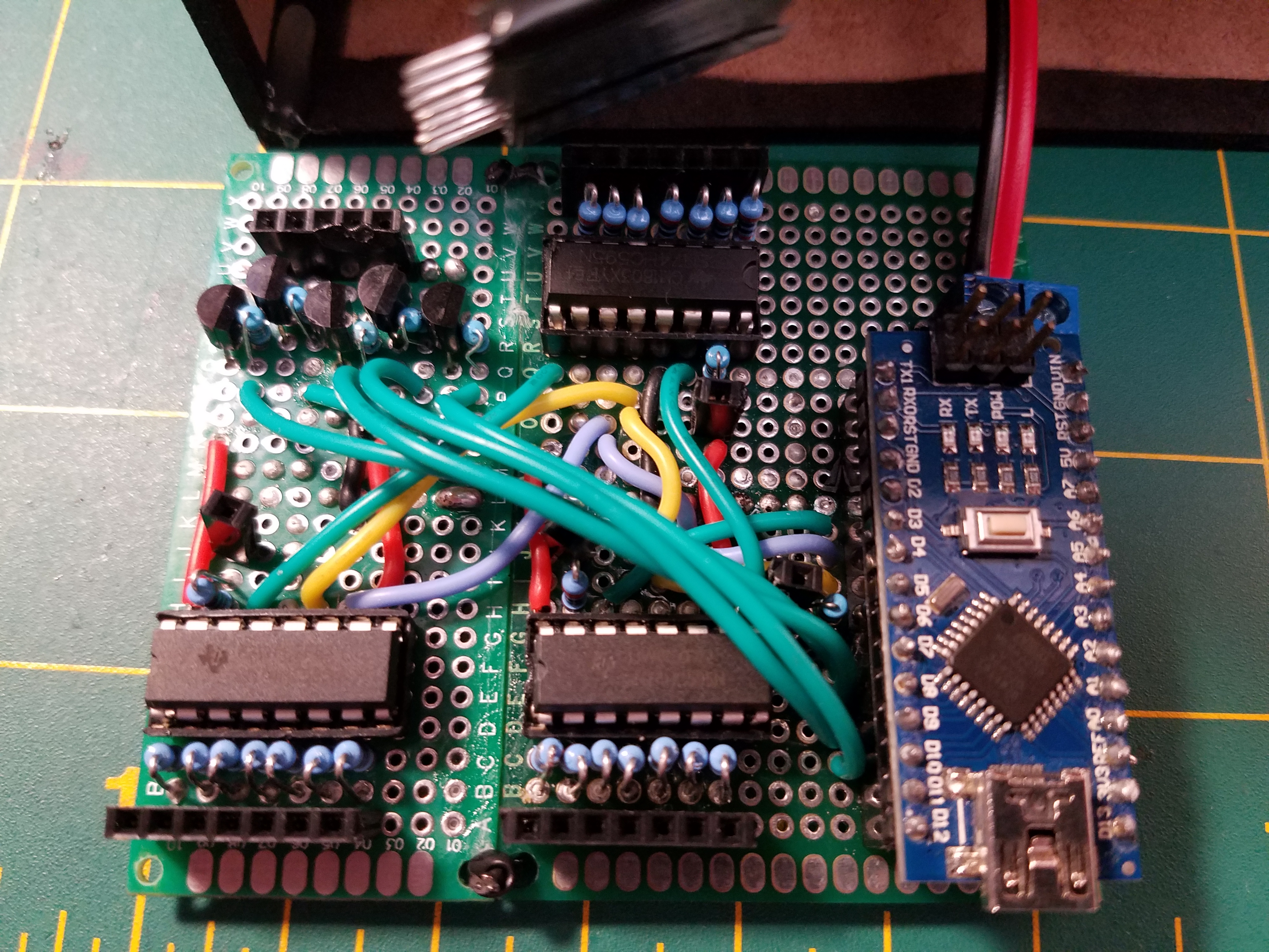 The board for the cube breaks features the Arduino Nano, three shift registers for controlling each column, and five transistors for controlling each layer